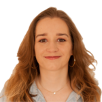 Woman with long light hair smiling at camera